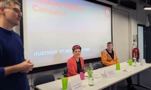 Hackney Cycling Campaign co-ordinator Garmon ap Garth introduces mayoral hustings, with Zoë Garbett, Green, and Simon de Deney, Liberal Democrats